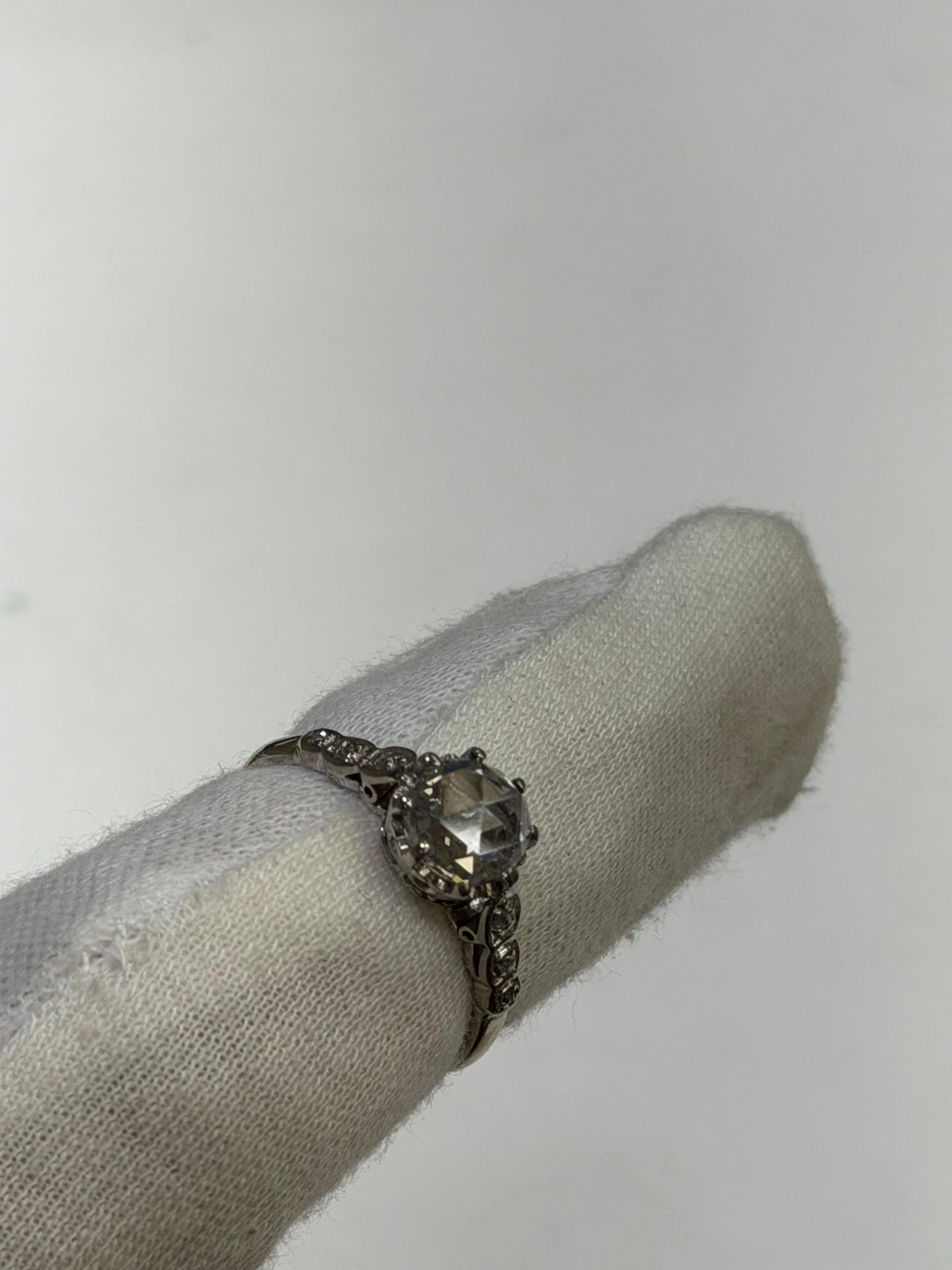 Antique 1910s Edwardian Platinum Engagement Ring featuring a Natural Rose Cut Diamond