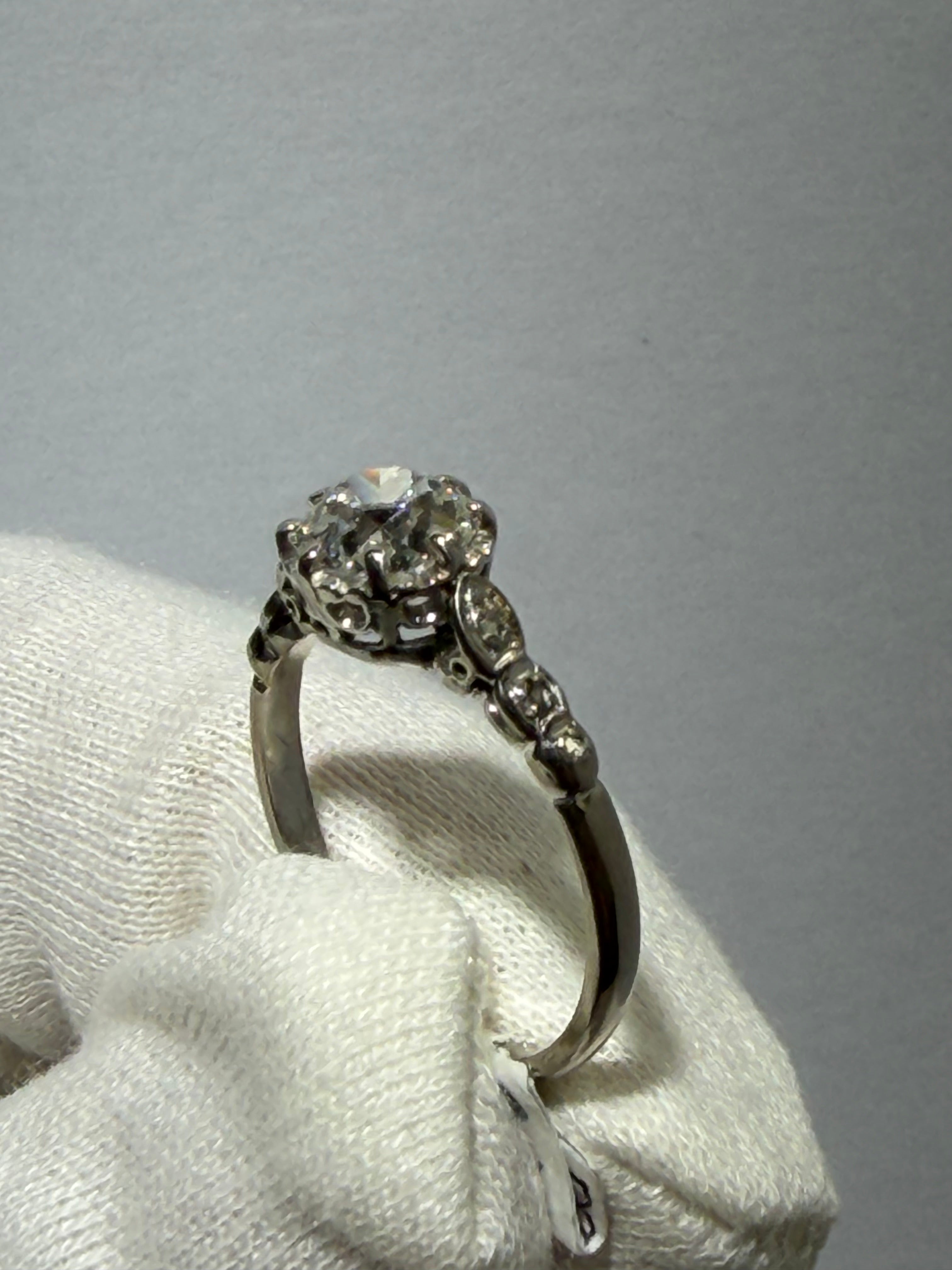 Art Deco Platinum Engagement Ring (c. 1920–1925) with 1.20 ct GIA Old European Cut Diamond & Antique Accent Diamonds