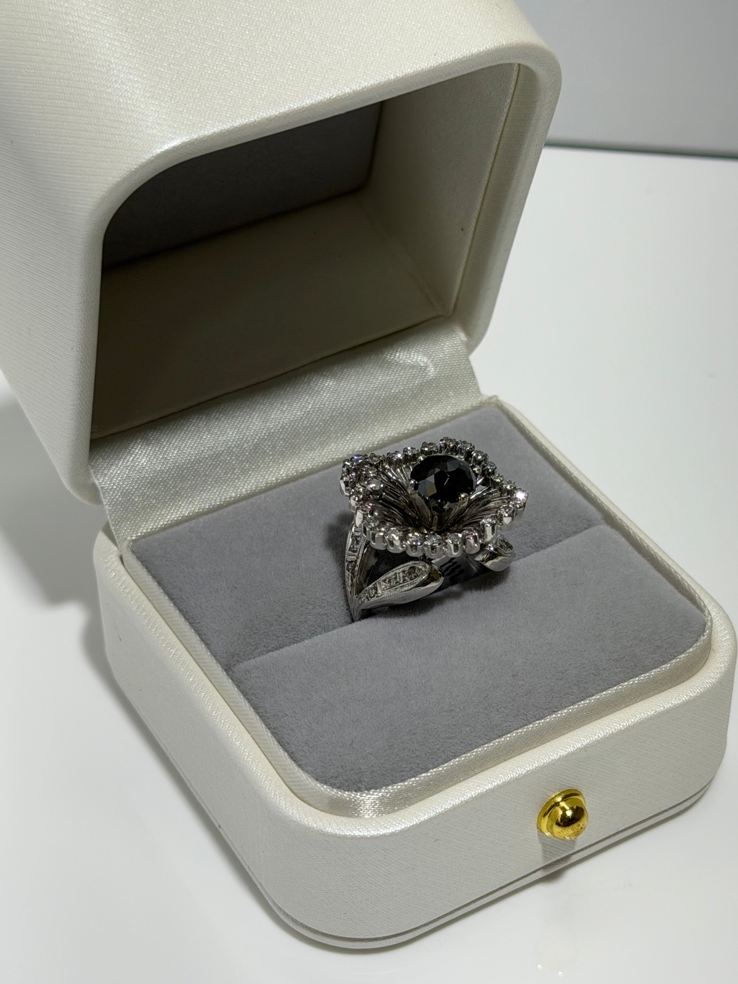 Art Deco Platinum Sunburst Ring (c. 1935–1941) with 1.54 ct Black Diamond & Approx. 1.00 ct Antique Single-Cut Diamond Halo