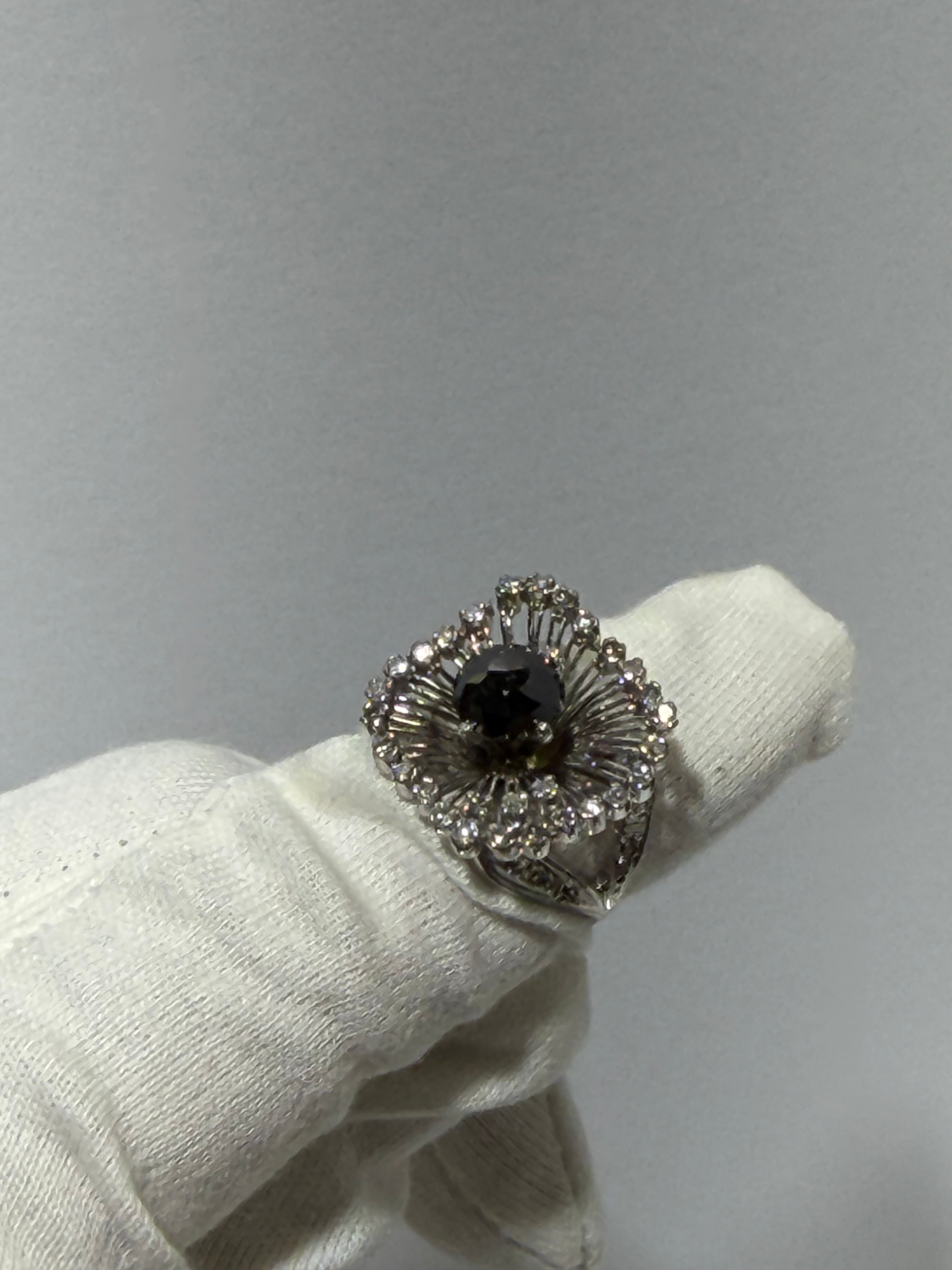 Art Deco Platinum Sunburst Ring (c. 1935–1941) with 1.54 ct Black Diamond & Approx. 1.00 ct Antique Single-Cut Diamond Halo