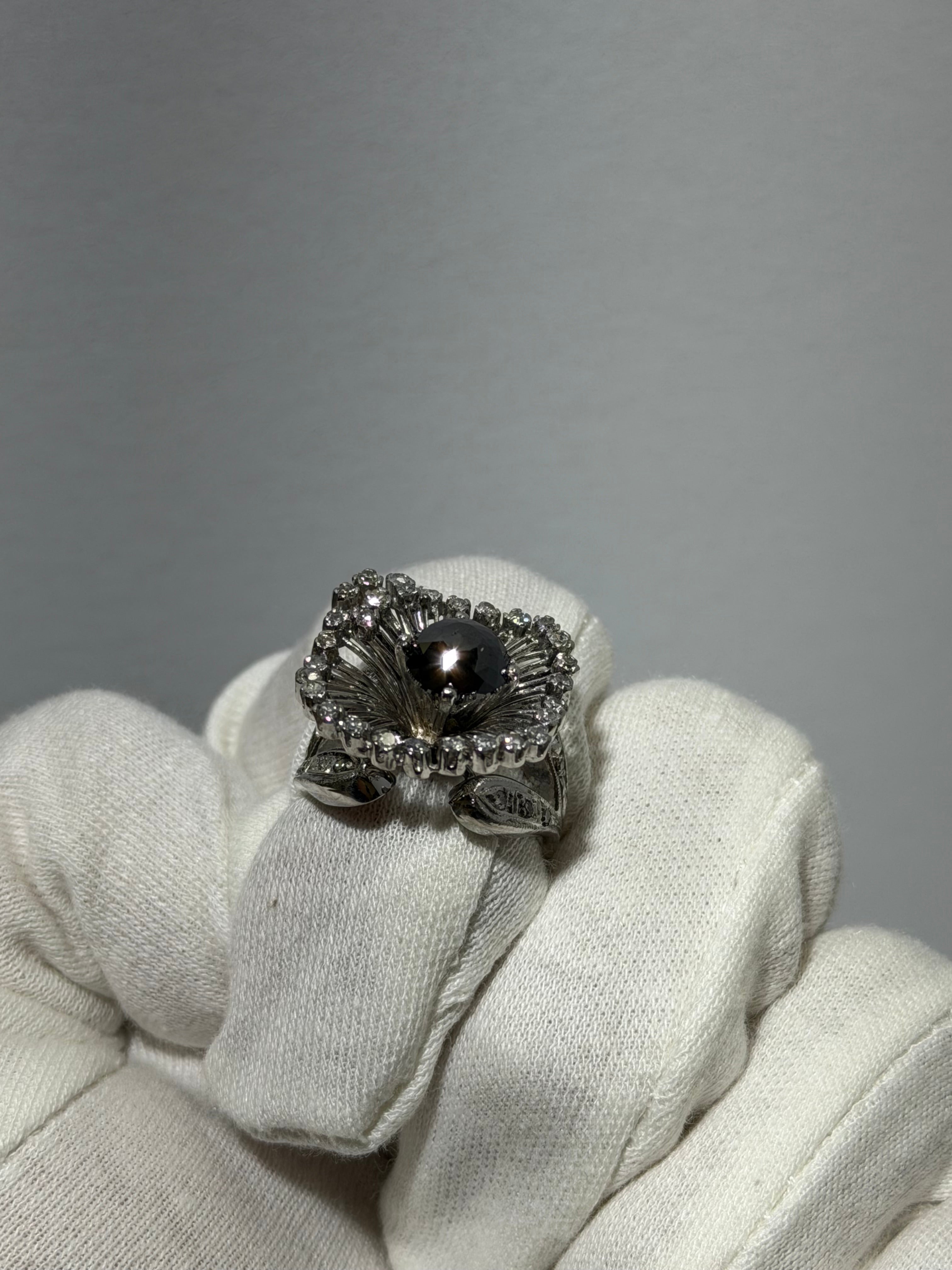 Art Deco Platinum Sunburst Ring (c. 1935–1941) with 1.54 ct Black Diamond & Approx. 1.00 ct Antique Single-Cut Diamond Halo