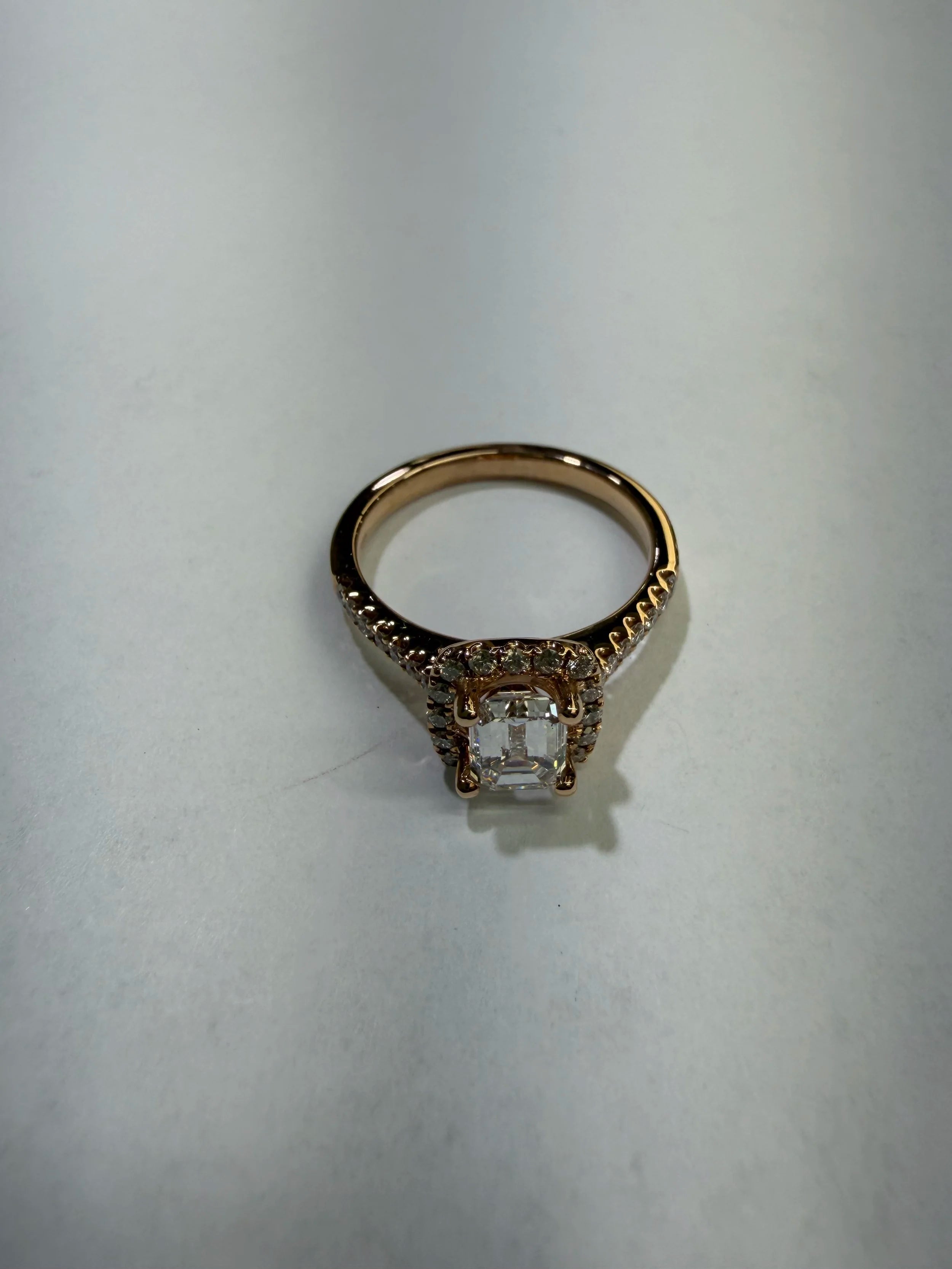 Rose Gold Emerald Cut Diamond Halo Ring with Pave