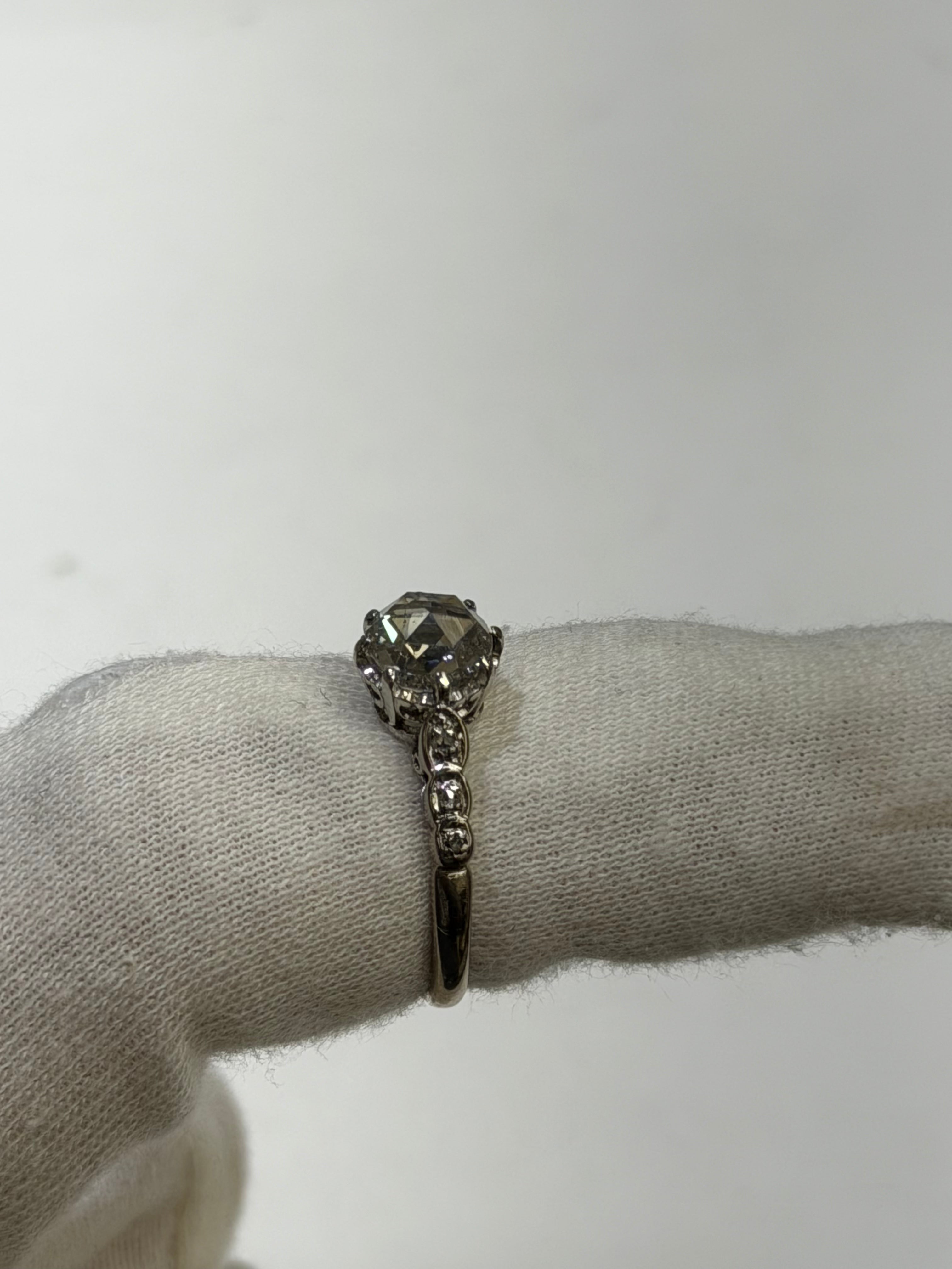 Antique 1910s Edwardian Platinum Engagement Ring featuring a Natural Rose Cut Diamond