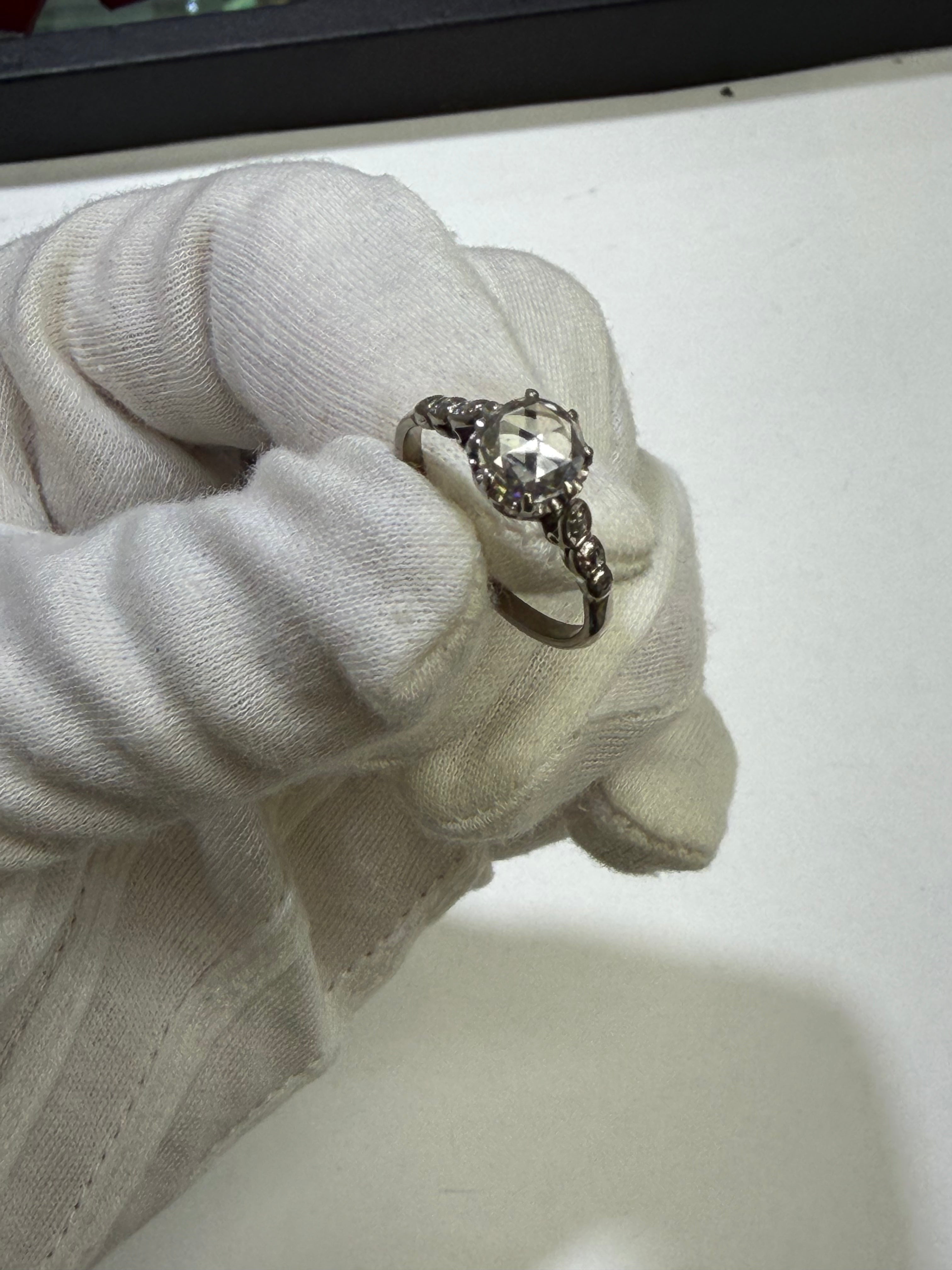 Antique 1910s Edwardian Platinum Engagement Ring featuring a Natural Rose Cut Diamond
