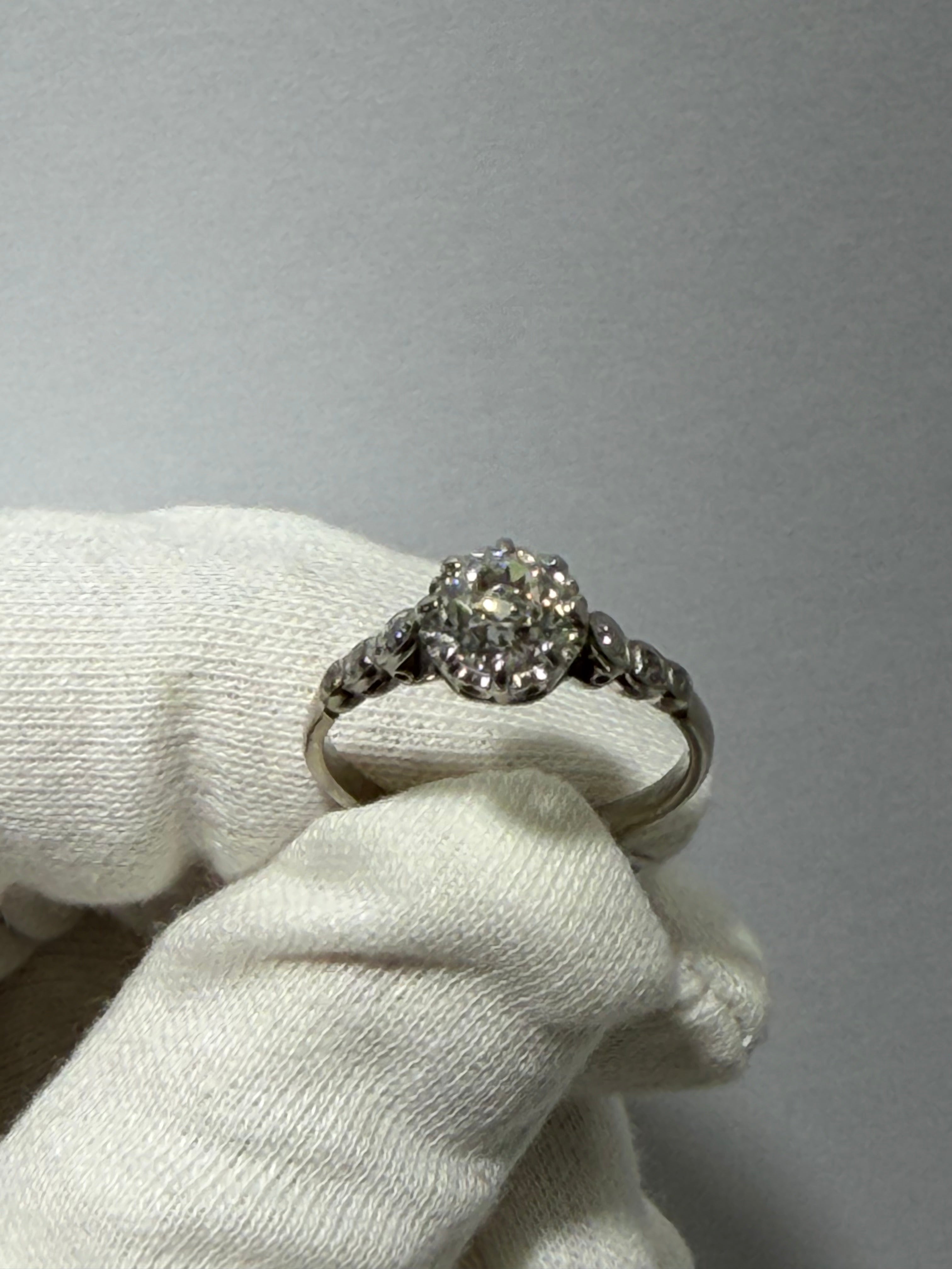 Art Deco Platinum Engagement Ring (c. 1920–1925) with 1.20 ct GIA Old European Cut Diamond & Antique Accent Diamonds