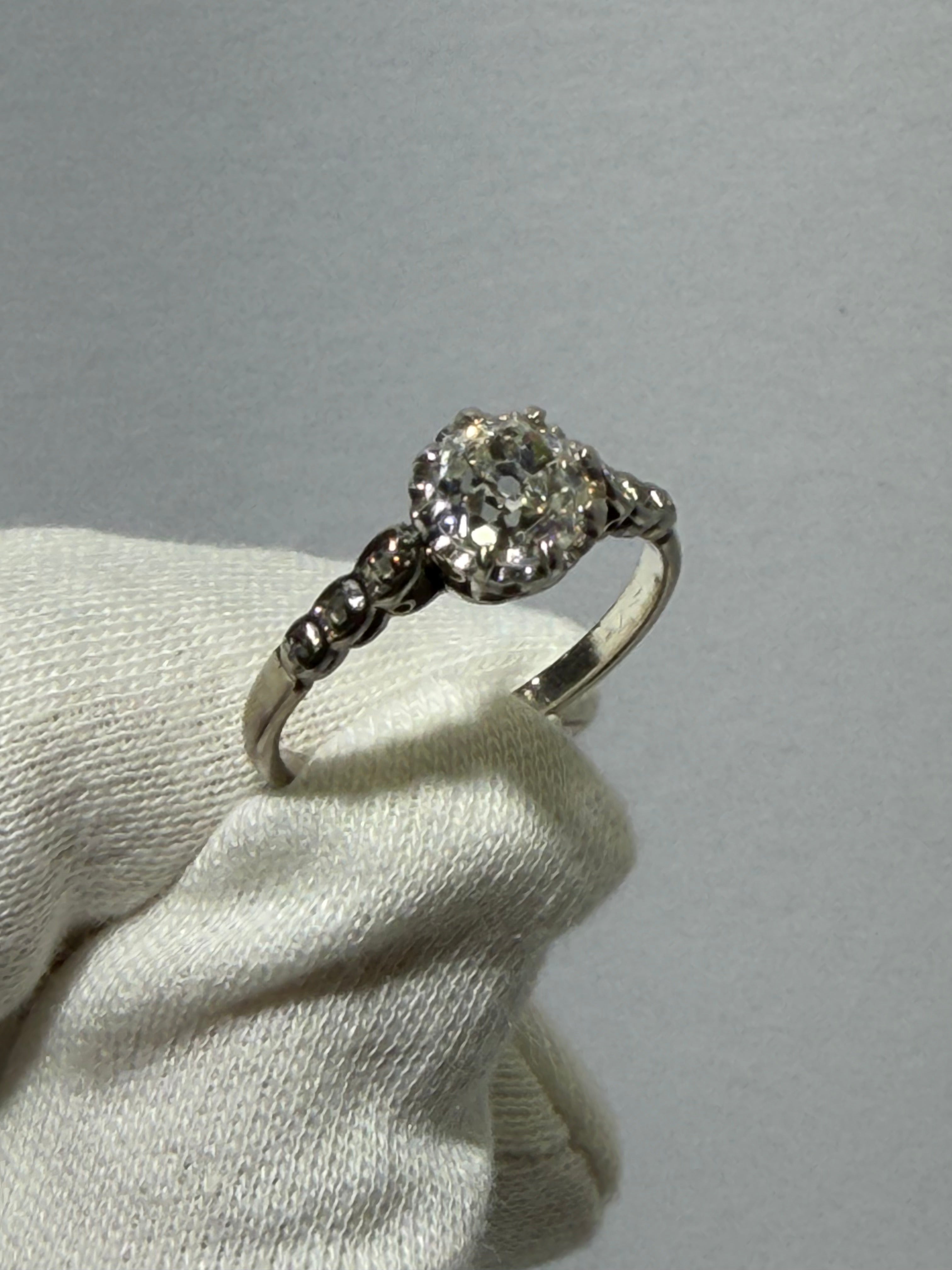 Art Deco Platinum Engagement Ring (c. 1920–1925) with 1.20 ct GIA Old European Cut Diamond & Antique Accent Diamonds