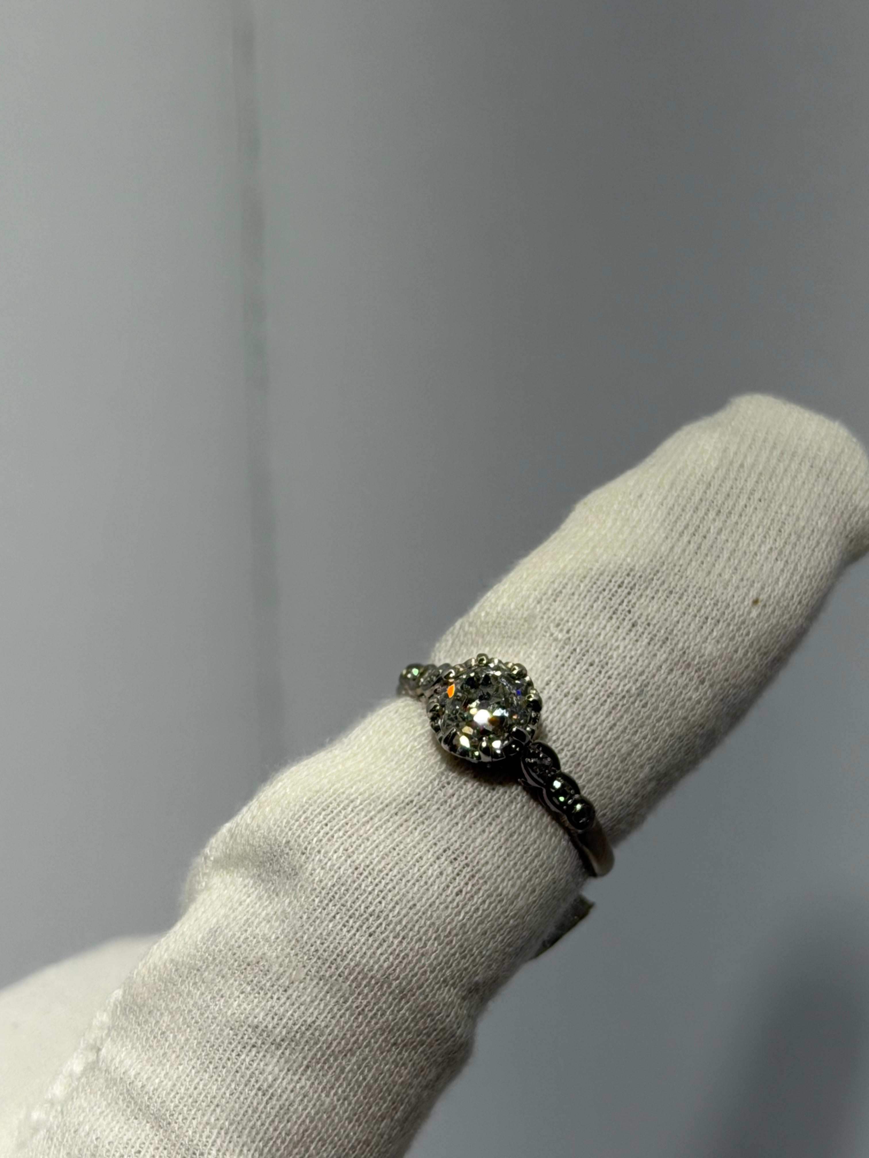 Art Deco Platinum Engagement Ring (c. 1920–1925) with 1.20 ct GIA Old European Cut Diamond & Antique Accent Diamonds