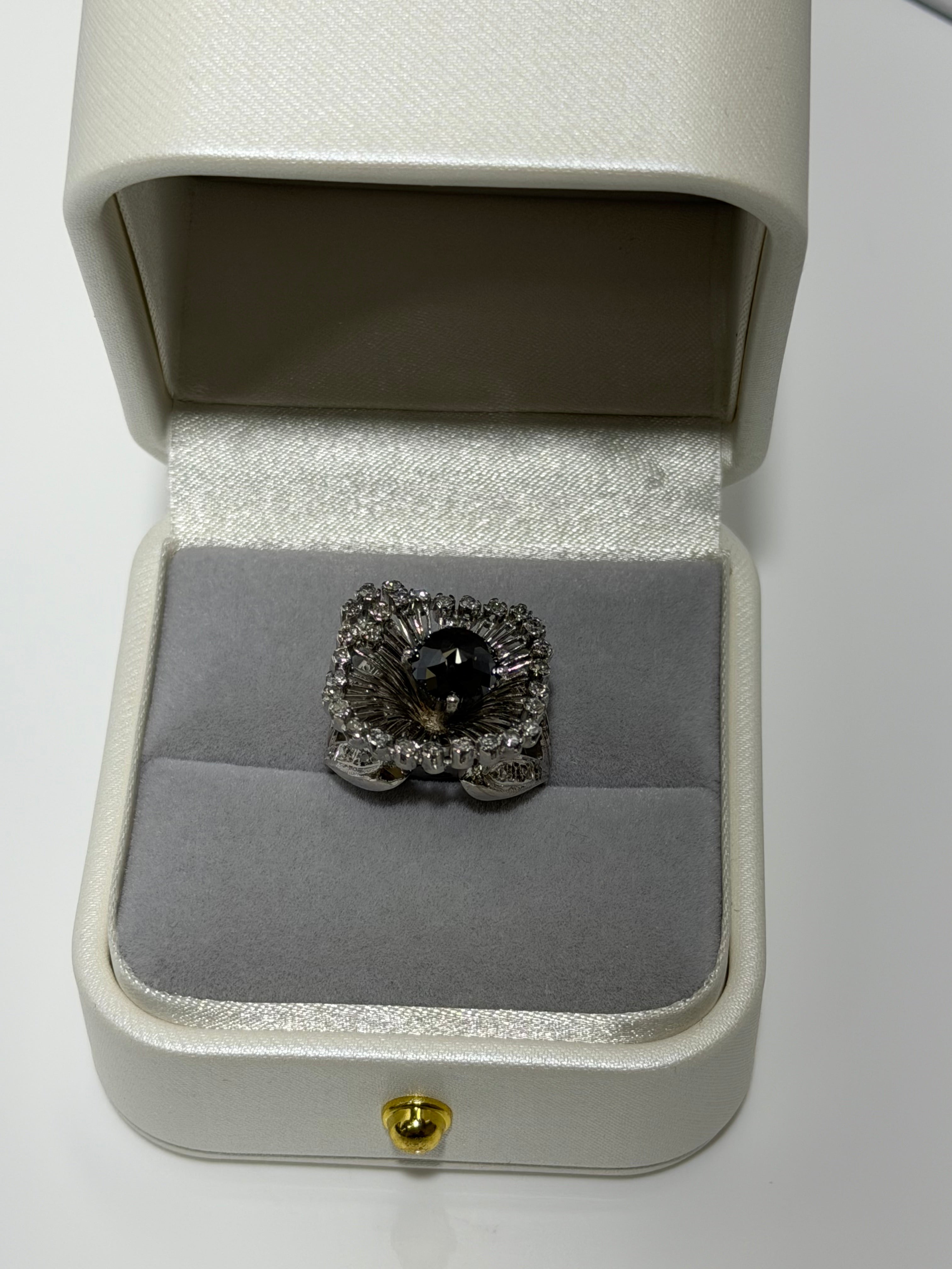 Art Deco Platinum Sunburst Ring (c. 1935–1941) with 1.54 ct Black Diamond & Approx. 1.00 ct Antique Single-Cut Diamond Halo