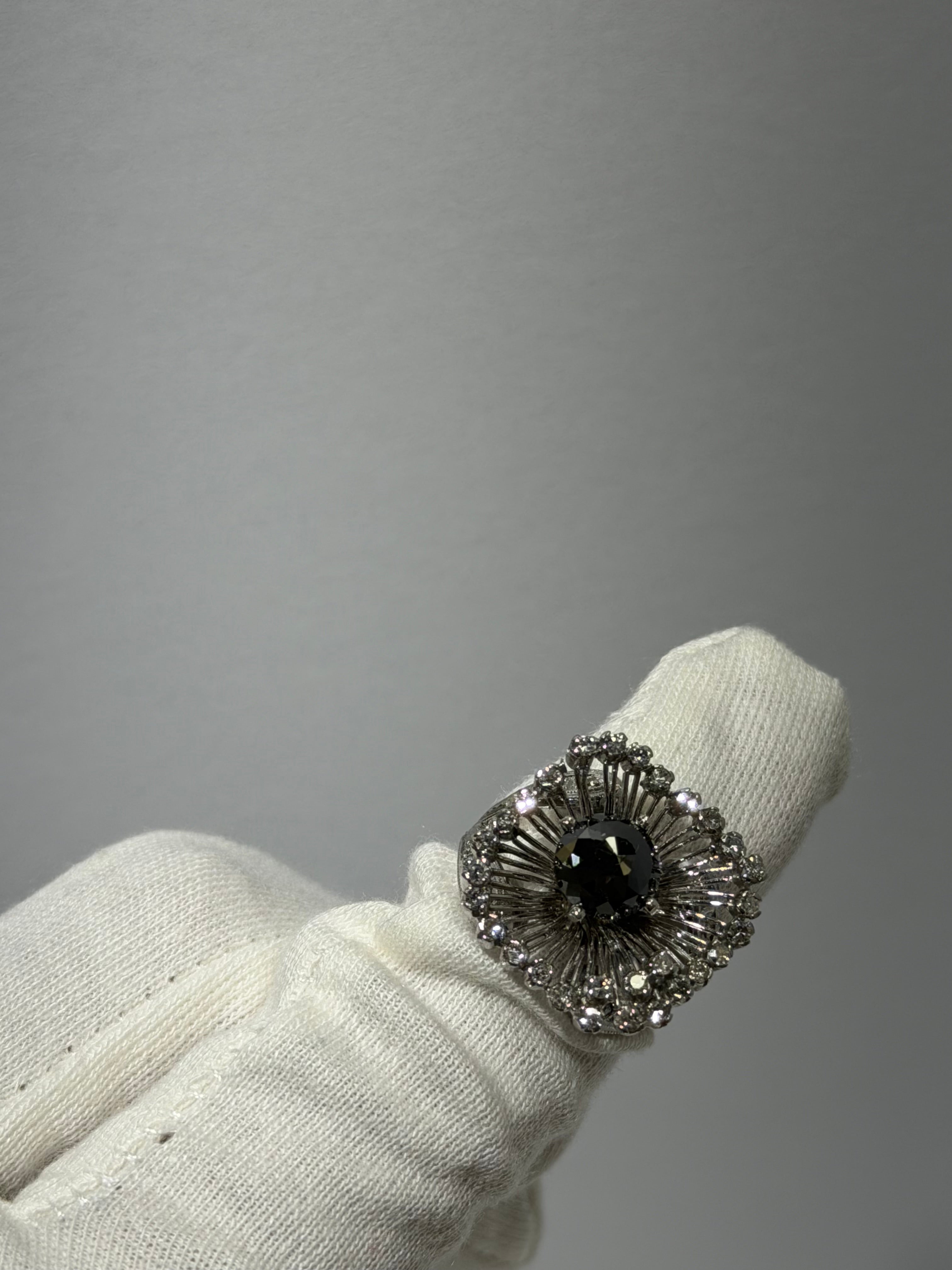 Art Deco Platinum Sunburst Ring (c. 1935–1941) with 1.54 ct Black Diamond & Approx. 1.00 ct Antique Single-Cut Diamond Halo